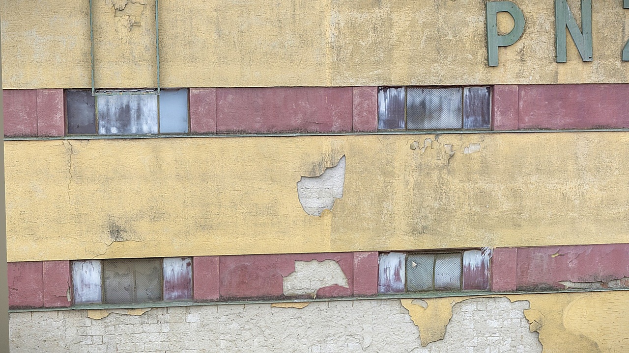 Media 1 for listing Industrial wall with long dirty windows